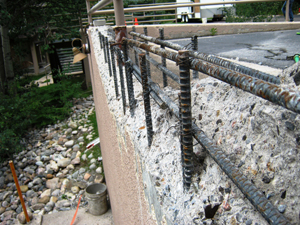 Fusion-Crete can repair damaged concrete retaining walls, even damage this extreme
